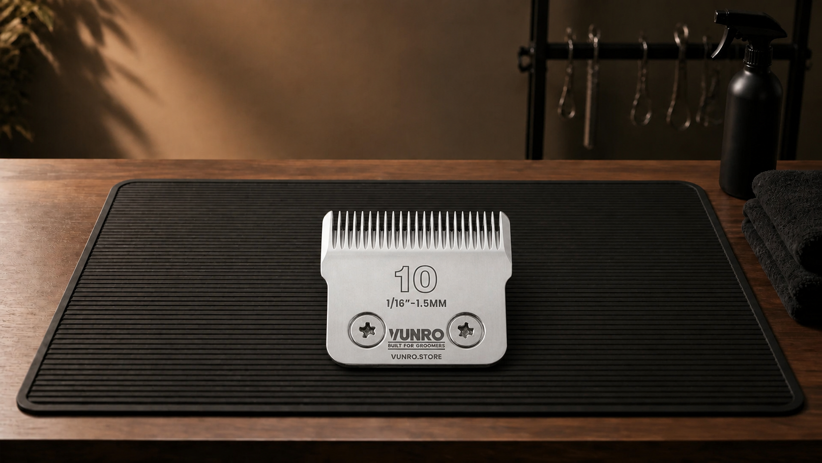 #10 Ceramic D-Series Dog Clipper Blade (1.5 mm) resting naturally on the VUNRO grooming workbench