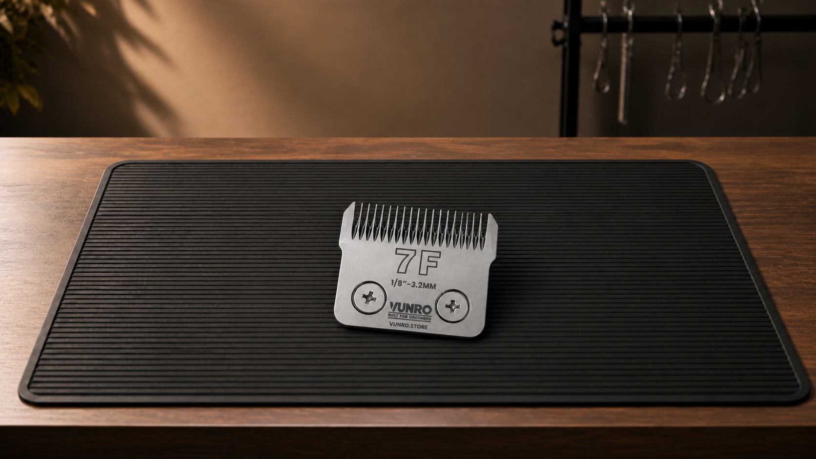 #7F Ceramic D-Series Dog Clipper Blade (3.2 mm) resting naturally on the VUNRO grooming workbench
